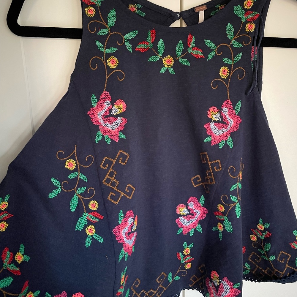 Free People sleeveless embroidered top in Navy multi.